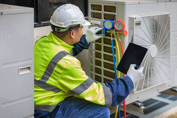 Professional Air Conditioning Repair technician working in Cumberland, RI